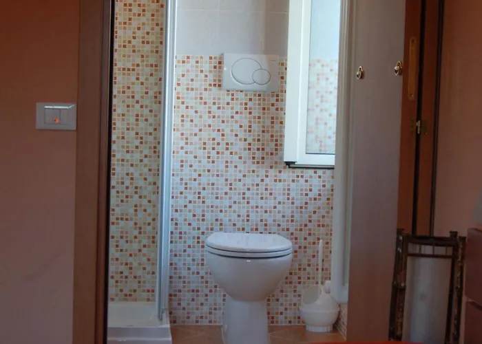 לינה וארוחת בוקר La Corte 3*